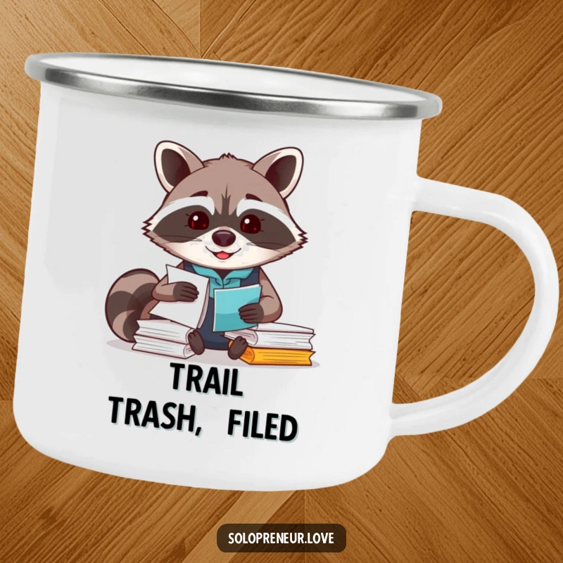 Funny Raccoon Organizer Camping Mug with a smiling raccoon character busy with paperwork, for outdoor use.