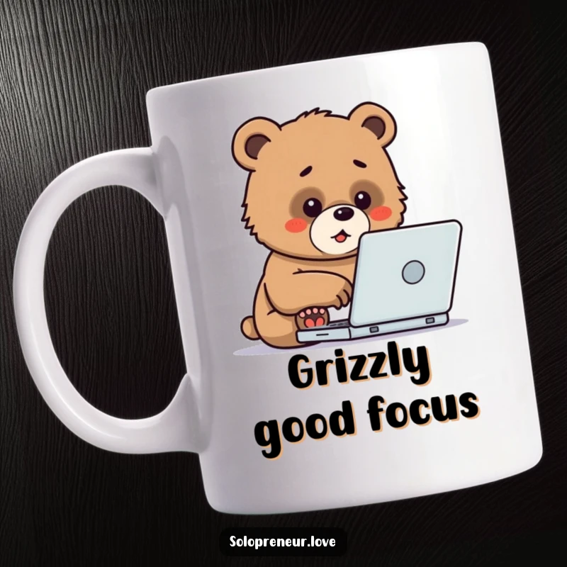 Funny Mug featuring a determined bear cub enthusiastically typing on a laptop, symbolizing hard work and cute determination.