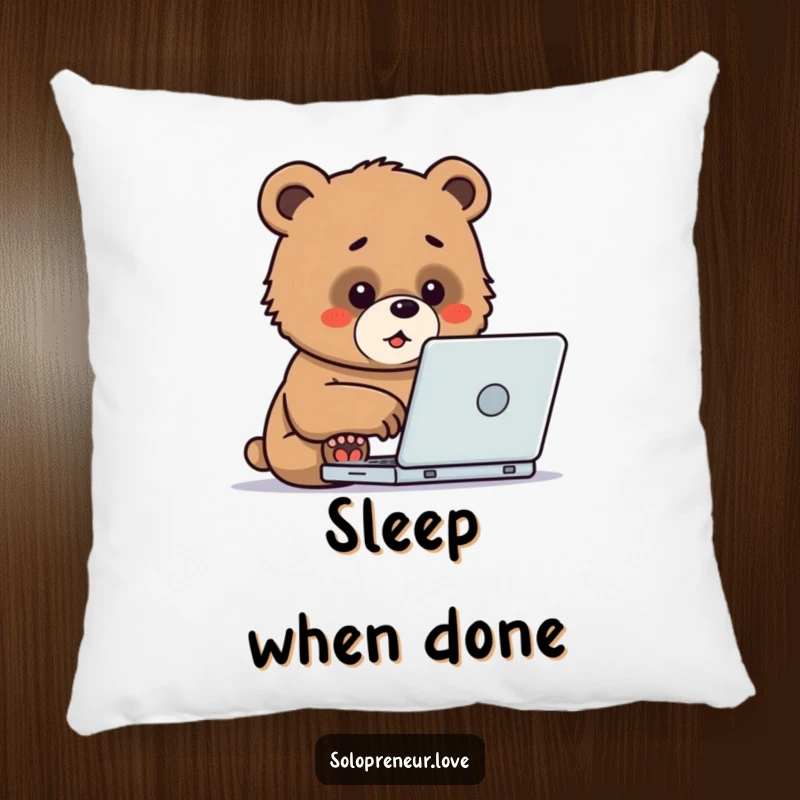 Funny Pillow adorned with a determined bear cub typing on a laptop, providing comfort and a humorous nod to work ethic.