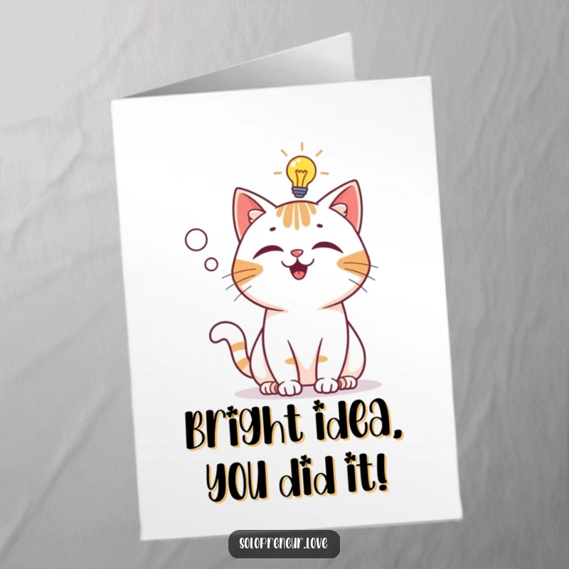 Funny Free Printable Congratulations Card: a cat character gets a bright idea, with a lit lightbulb appearing in its thought bubble.