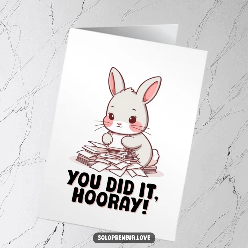 Funny Free Printable Congrats Card: A determined rabbit overwhelmed by papers, celebrating a big win with humor.