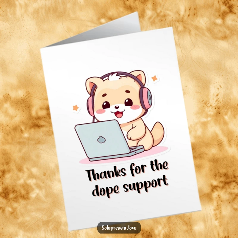 Funny free printable thank you card of a cute creature with headphones on, happily tapping away on a laptop, expressing thanks.