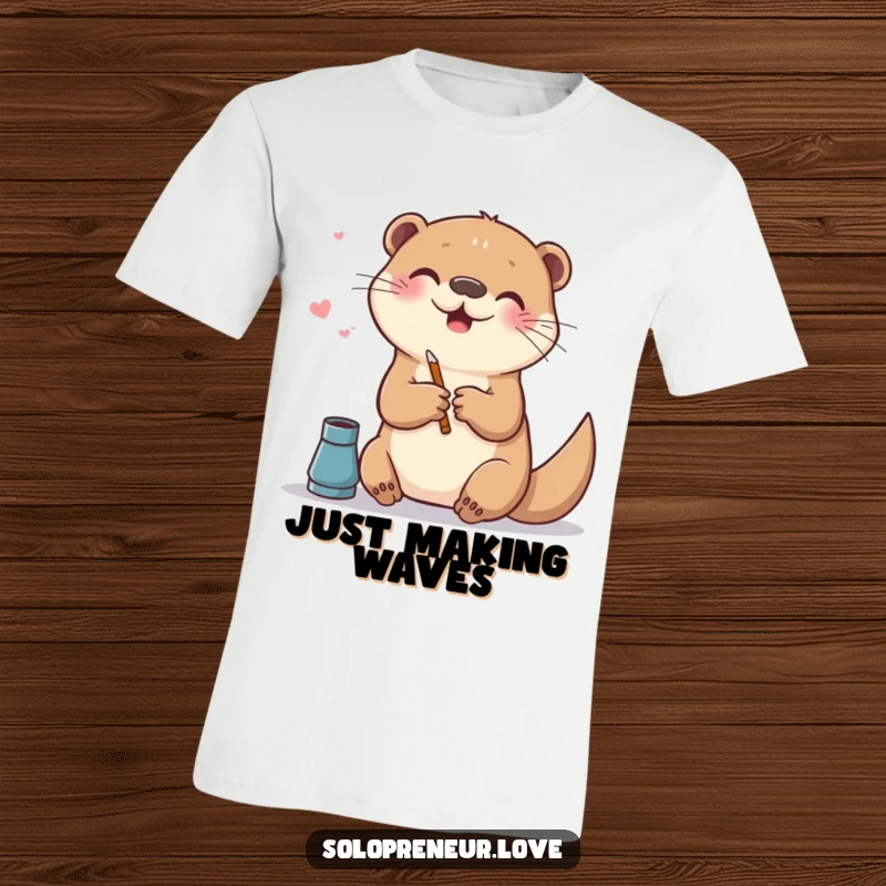 Funny t-shirt featuring a happy otter creating digital art on a canvas, showcasing fun and artistic talent.