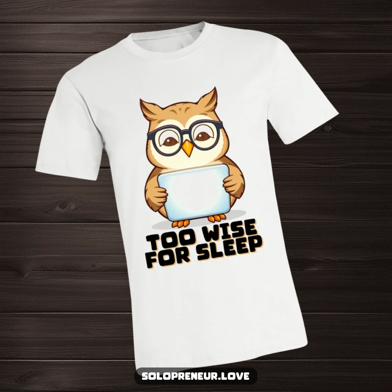 Funny owl character with glasses intently reading a glowing tablet, printed on a witty and humorous t-shirt.