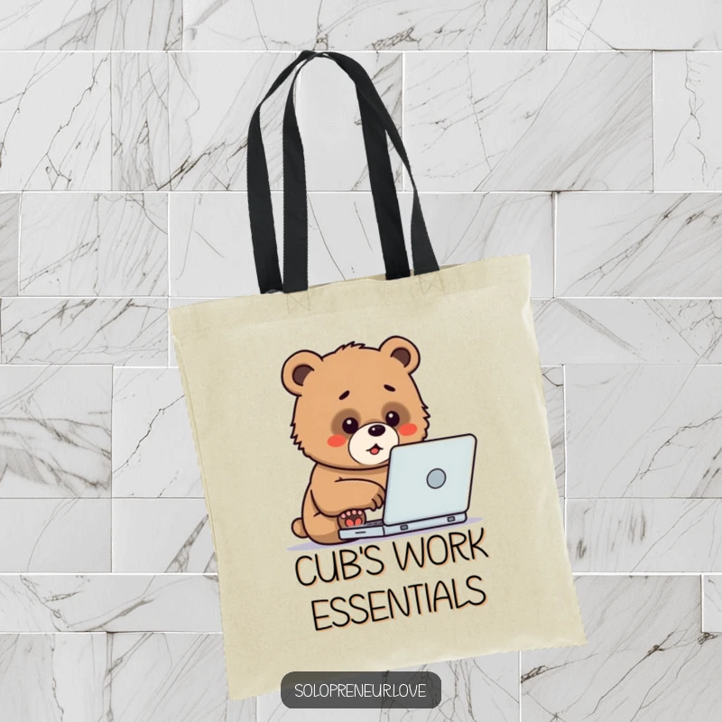 Funny Tote Bag featuring a determined bear cub enthusiastically typing on a laptop, ideal for carrying work essentials with a humorous touch.