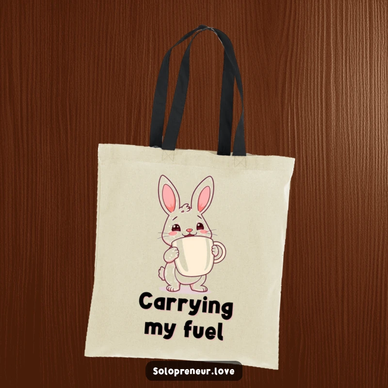 Funny rabbit coffee tote bag showcasing a determined rabbit cheerfully holding a large coffee cup, perfect for daily errands.